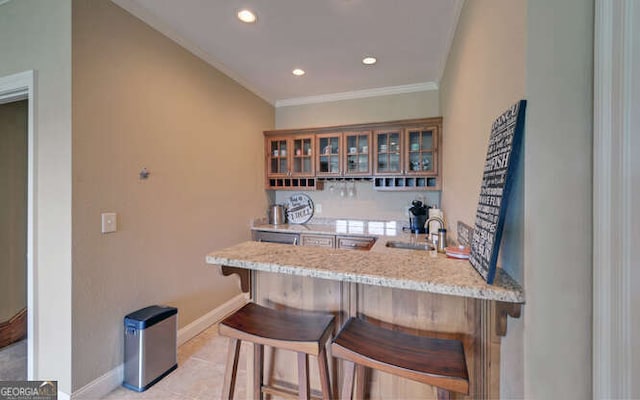 2156 Mockingbird Ln, Hiawassee, GA 30546 - indoor bar with crown molding, recessed lighting, baseboards, and light tile patterned flooring