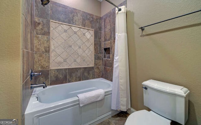 2156 Mockingbird Ln, Hiawassee, GA 30546 - bathroom with toilet, shower / bath combo, and a textured wall