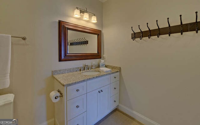 2156 Mockingbird Ln, Hiawassee, GA 30546 - bathroom with vanity, baseboards, and toilet