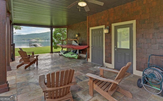 2156 Mockingbird Ln, Hiawassee, GA 30546 - view of patio / terrace featuring ceiling fan and a water view