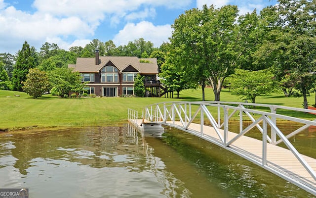 2156 Mockingbird Ln, Hiawassee, GA 30546 - dock featuring a water view and a lawn