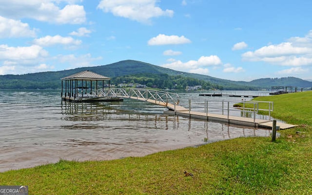 2156 Mockingbird Ln, Hiawassee, GA 30546 - dock with a water and mountain view and a lawn