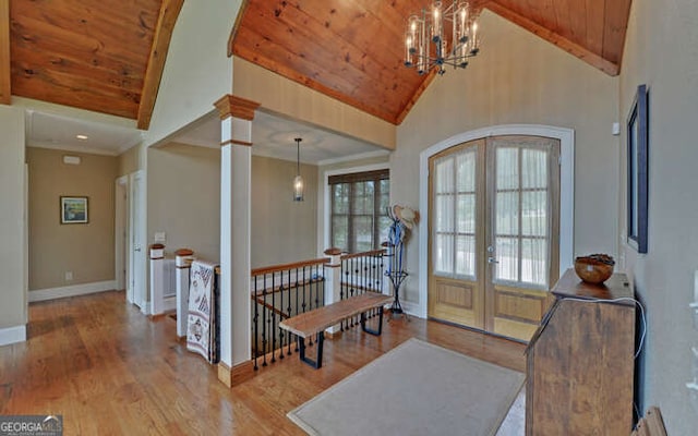 2156 Mockingbird Ln, Hiawassee, GA 30546 - entryway with wooden ceiling with exposed beams, french doors, wood finished floors, baseboards, and a chandelier