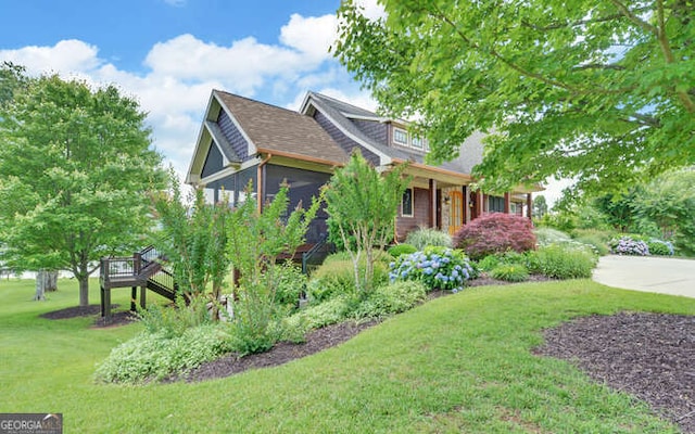2156 Mockingbird Ln, Hiawassee, GA 30546 - view of front of house with a front lawn and a wooden deck