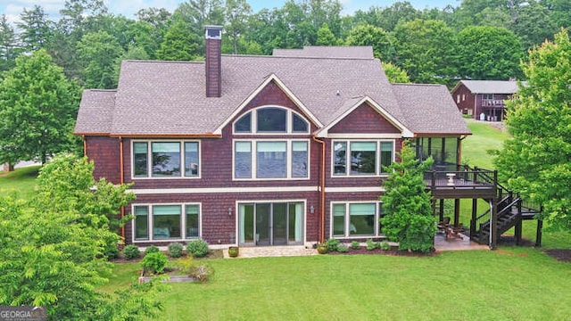2156 Mockingbird Ln, Hiawassee, GA 30546 - back of house featuring a lawn, a chimney, a patio, and stairs
