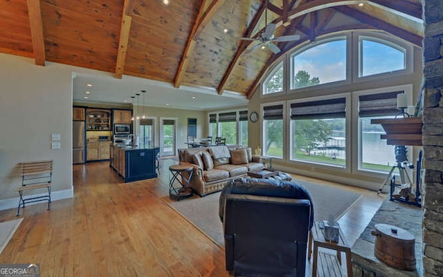 2156 Mockingbird Ln, Hiawassee, GA 30546 - living room with light wood-style floors, high vaulted ceiling, baseboards, a ceiling fan, and wooden ceiling with exposed beams