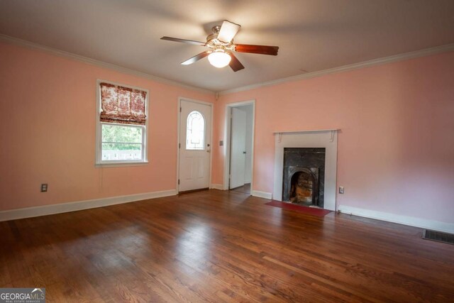 140 Lakeview St, Athens, GA 30601 - unfurnished living room featuring ceiling fan, ornamental molding, a fireplace with flush hearth, and wood finished floors