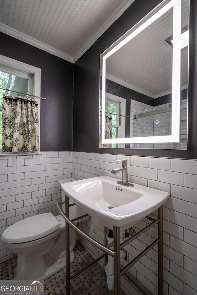 140 Lakeview St, Athens, GA 30601 - bathroom featuring tile walls, ornamental molding, and wainscoting