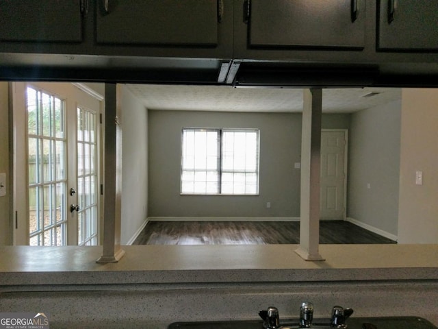 2566 Stratford Ln, Morrow, GA 30260 - detailed view of wood finished floors, baseboards, and french doors