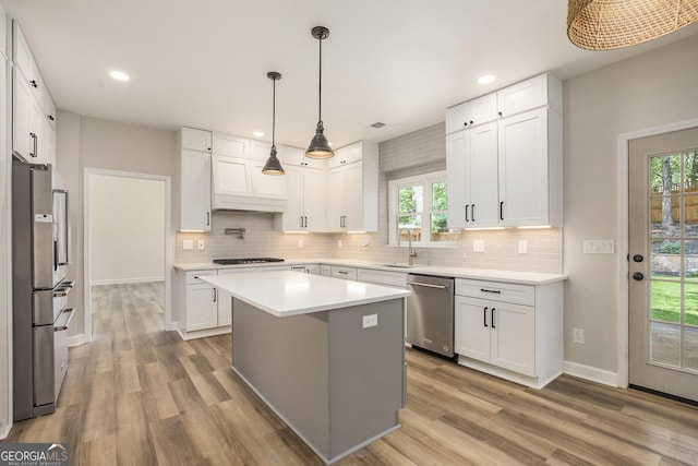 300 Windsor Chase Trl, Johns Creek, GA 30097 - kitchen with appliances with stainless steel finishes, recessed lighting, backsplash, light countertops, and a sink