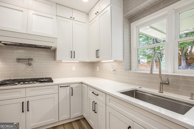 300 Windsor Chase Trl, Johns Creek, GA 30097 - kitchen with a sink, decorative backsplash, white cabinetry, and light countertops