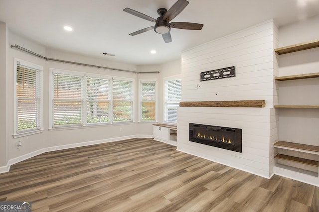 300 Windsor Chase Trl, Johns Creek, GA 30097 - unfurnished living room featuring recessed lighting, ceiling fan, wood finished floors, baseboards, and a fireplace