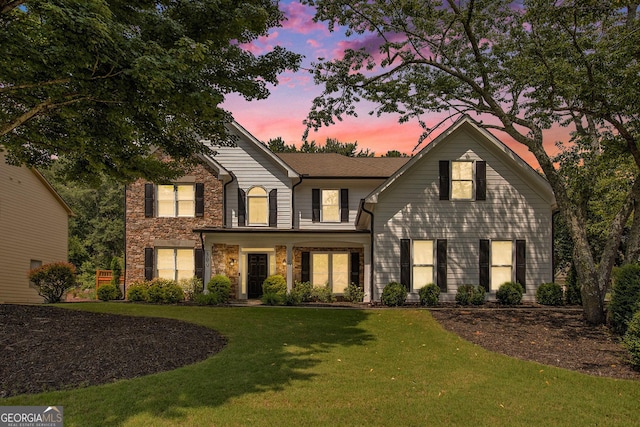 300 Windsor Chase Trl, Johns Creek, GA 30097 - traditional-style house featuring a lawn and stone siding