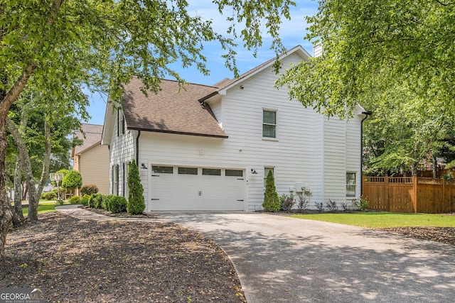 300 Windsor Chase Trl, Johns Creek, GA 30097 - view of side of property with roof with shingles, concrete driveway, and an attached garage
