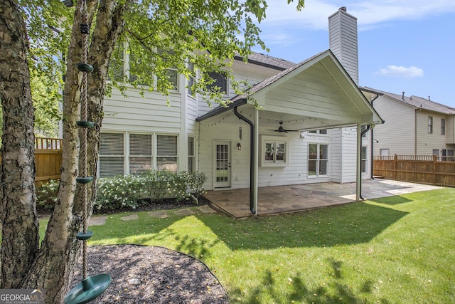 300 Windsor Chase Trl, Johns Creek, GA 30097 - rear view of house with a ceiling fan, a patio, and a chimney