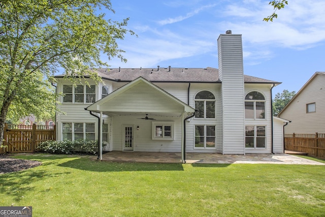 300 Windsor Chase Trl, Johns Creek, GA 30097 - back of property featuring a patio, ceiling fan, a chimney, and roof with shingles