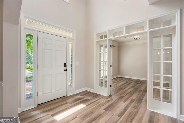 300 Windsor Chase Trl, Johns Creek, GA 30097 - entryway featuring wood finished floors, baseboards, and french doors