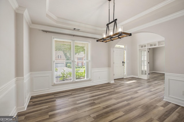 300 Windsor Chase Trl, Johns Creek, GA 30097 - foyer with arched walkways, wood finished floors, a wainscoted wall, a raised ceiling, and ornamental molding