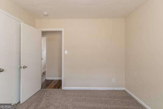 933 Capitol View Ave NW, Atlanta, GA 30318 - unfurnished room featuring carpet and a smoke detector