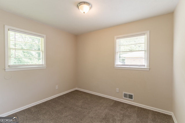 933 Capitol View Ave NW, Atlanta, GA 30318 - spare room with dark carpet