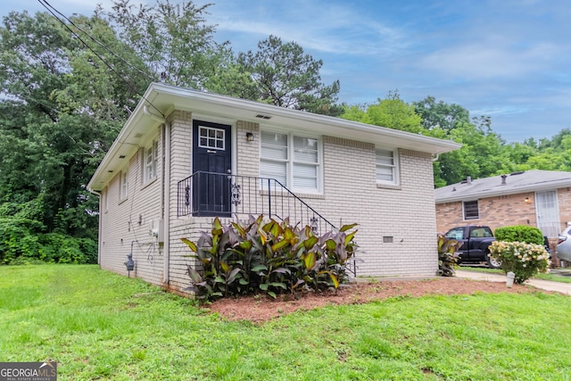 933 Capitol View Ave NW, Atlanta, GA 30318 - view of front of home with a front lawn and brick siding