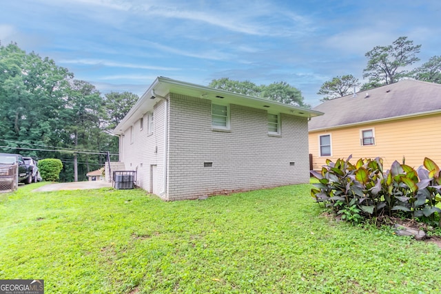 933 Capitol View Ave NW, Atlanta, GA 30318 - back of house featuring a lawn and brick siding