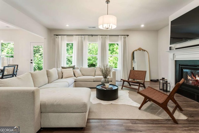 160 Winner St, Acworth, GA 30102 - living room featuring wood finished floors, recessed lighting, and a glass covered fireplace