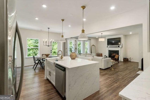 160 Winner St, Acworth, GA 30102 - kitchen with appliances with stainless steel finishes, recessed lighting, plenty of natural light, white cabinets, and dark wood-style flooring