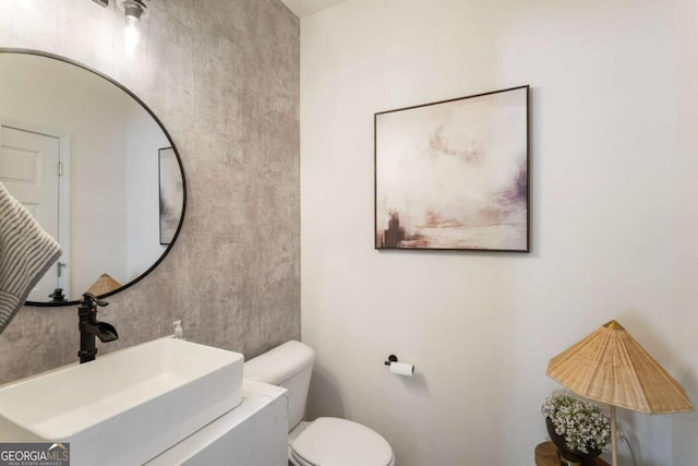 160 Winner St, Acworth, GA 30102 - half bathroom featuring toilet and vanity