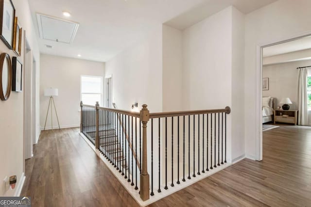 160 Winner St, Acworth, GA 30102 - hallway with attic access, an upstairs landing, wood finished floors, baseboards, and recessed lighting