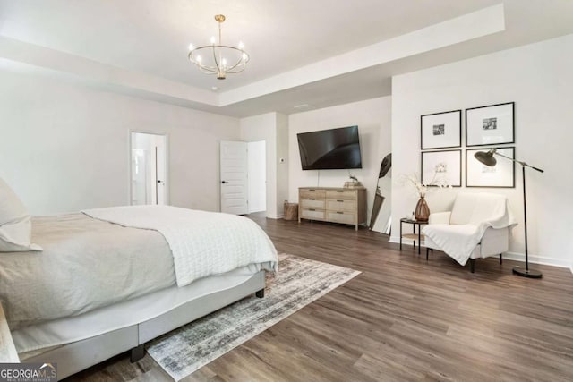 160 Winner St, Acworth, GA 30102 - bedroom with a raised ceiling, a chandelier, wood finished floors, and baseboards