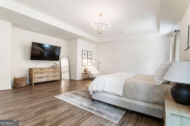 160 Winner St, Acworth, GA 30102 - bedroom with a raised ceiling, a chandelier, wood finished floors, and baseboards