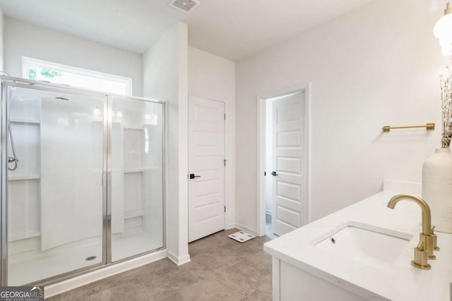 160 Winner St, Acworth, GA 30102 - full bathroom with a shower stall, double vanity, and baseboards
