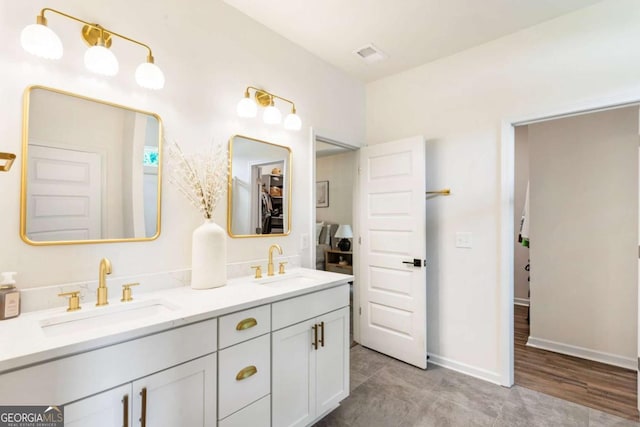 160 Winner St, Acworth, GA 30102 - bathroom with double vanity, tile patterned flooring, and baseboards