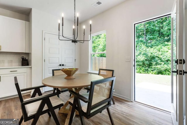 160 Winner St, Acworth, GA 30102 - dining room with a chandelier and wood finished floors