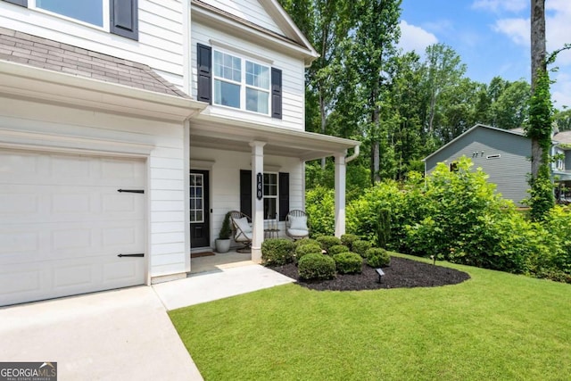 160 Winner St, Acworth, GA 30102 - doorway to property with covered porch, a lawn, and a garage