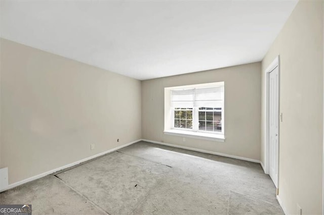 57 Cantey Pl NW, Atlanta, GA 30327 - unfurnished room with carpet floors and baseboards