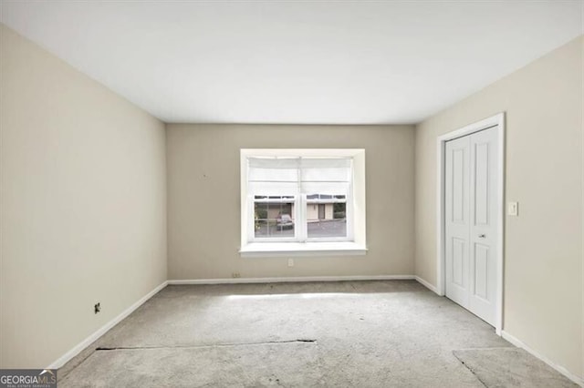 57 Cantey Pl NW, Atlanta, GA 30327 - spare room featuring carpet flooring and baseboards