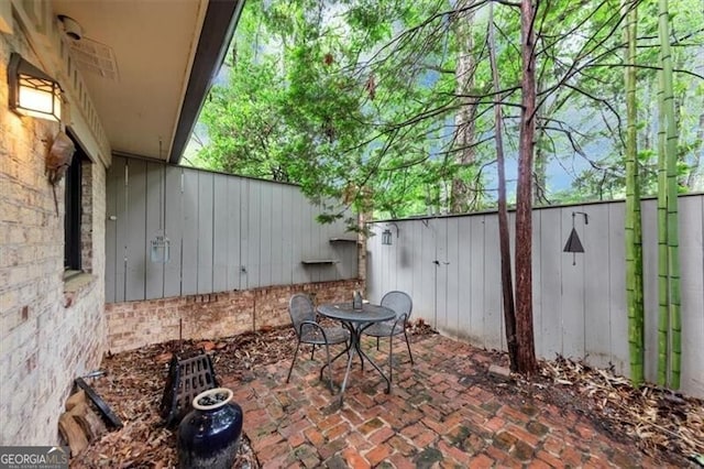 57 Cantey Pl NW, Atlanta, GA 30327 - fenced backyard featuring a patio area