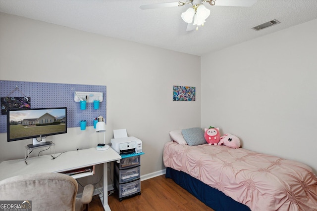 903 Teepee Way, Statesboro, GA 30461 - bedroom with wood finished floors, baseboards, and ceiling fan