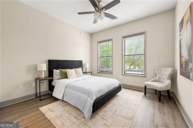 425 Chapel St SW Unit 1107, Atlanta, GA 30313 - bedroom with light wood finished floors and a ceiling fan