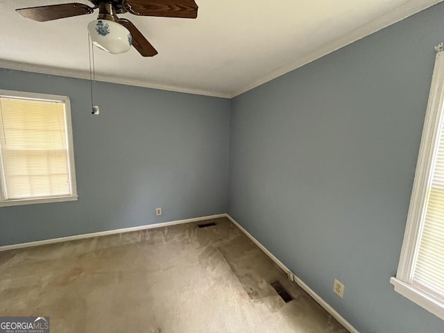 2972 Clairmont Ave, Macon, GA 31204 - carpeted empty room with a ceiling fan, ornamental molding, baseboards, and healthy amount of natural light
