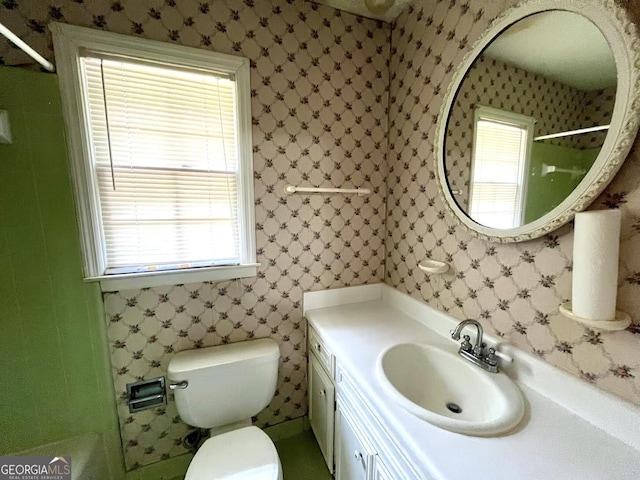 2972 Clairmont Ave, Macon, GA 31204 - bathroom featuring healthy amount of natural light, vanity, and toilet