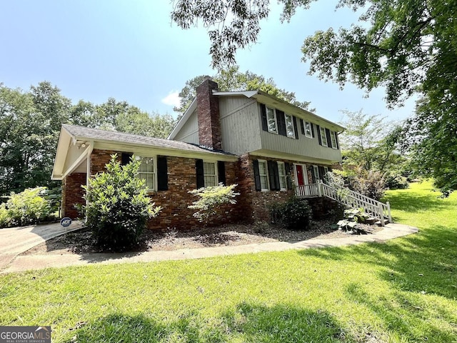 2972 Clairmont Ave, Macon, GA 31204 - view of side of property featuring a chimney, a yard, and brick siding