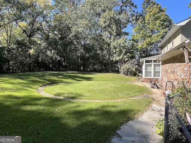 2972 Clairmont Ave, Macon, GA 31204 - view of grassy yard featuring a sunroom