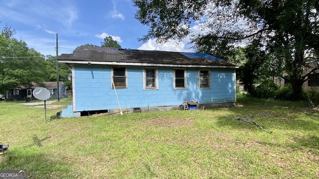 609 Virginia Cir, Montezuma, GA 31063 - rear view of property with a yard