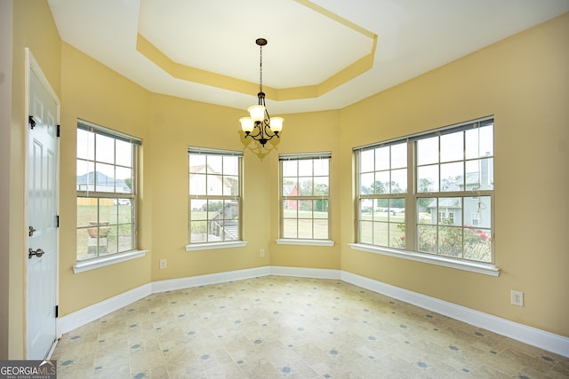 104 Hamilton Lake View Ct, Lagrange, GA 30241 - unfurnished dining area with a chandelier, a tray ceiling, and baseboards