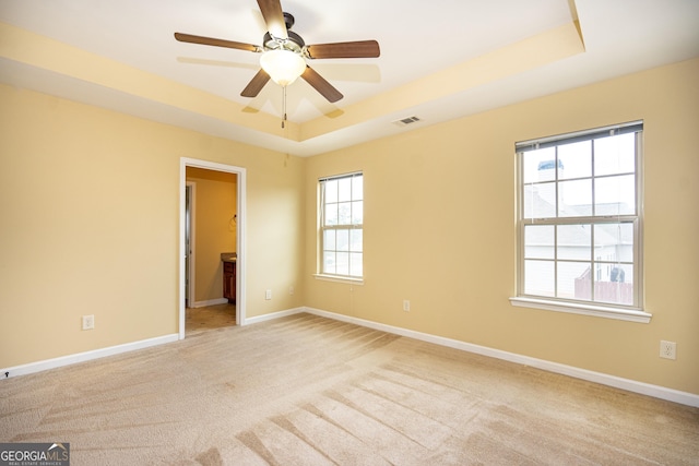 104 Hamilton Lake View Ct, Lagrange, GA 30241 - unfurnished room featuring a tray ceiling, carpet flooring, a ceiling fan, and baseboards