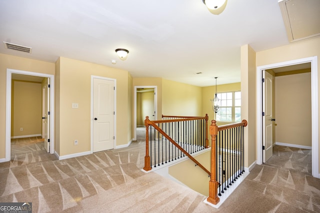 104 Hamilton Lake View Ct, Lagrange, GA 30241 - hall featuring an upstairs landing, carpet, attic access, and baseboards