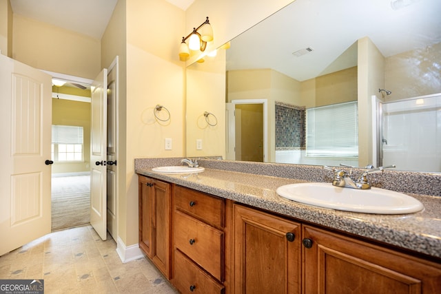 104 Hamilton Lake View Ct, Lagrange, GA 30241 - bathroom featuring double vanity, a shower, and tile patterned flooring